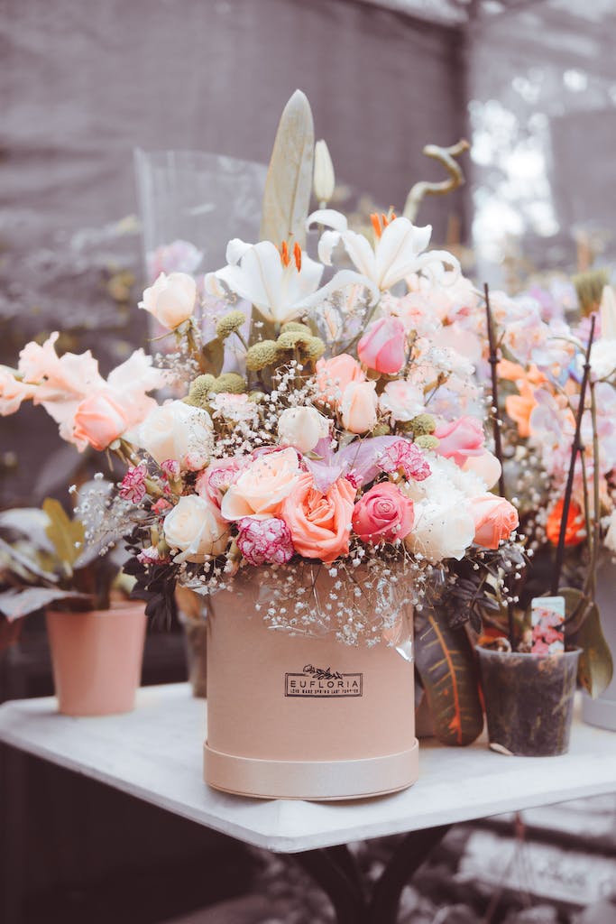 Multicolored Flowers on Beige Ceramic Pot