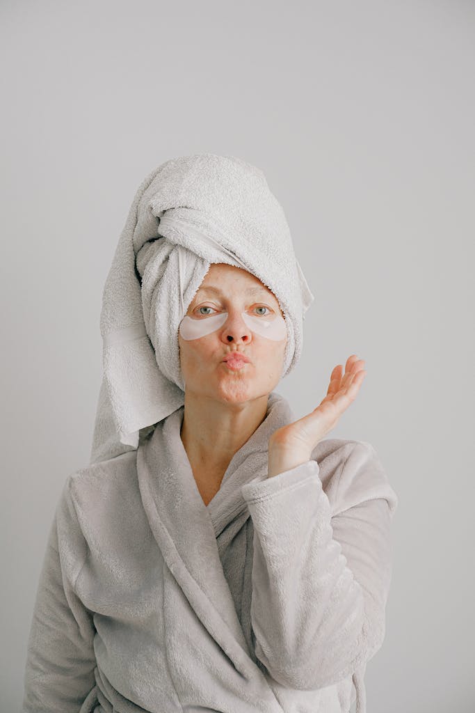 Woman in Gray Bathrobe Pouting